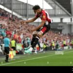 brentfords-kevin-schade-celebrates-scoring-their-sides-first-goal-of-the-game-during-the-premier-league-match-at-the-gtech-community-stadium-london-picture-date-saturday-august-26-2023-2RKYWRK